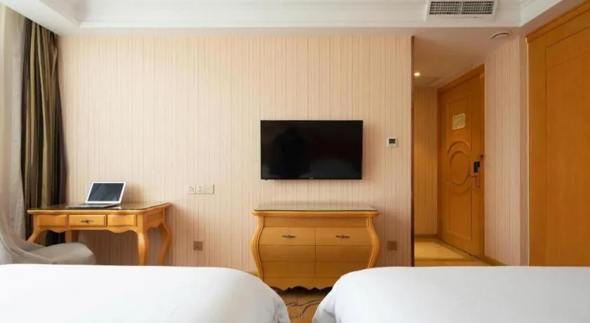 Bed in Vienna Hotel Tianjin 5th Avenue Youyi Road Cultural Center Metro Station