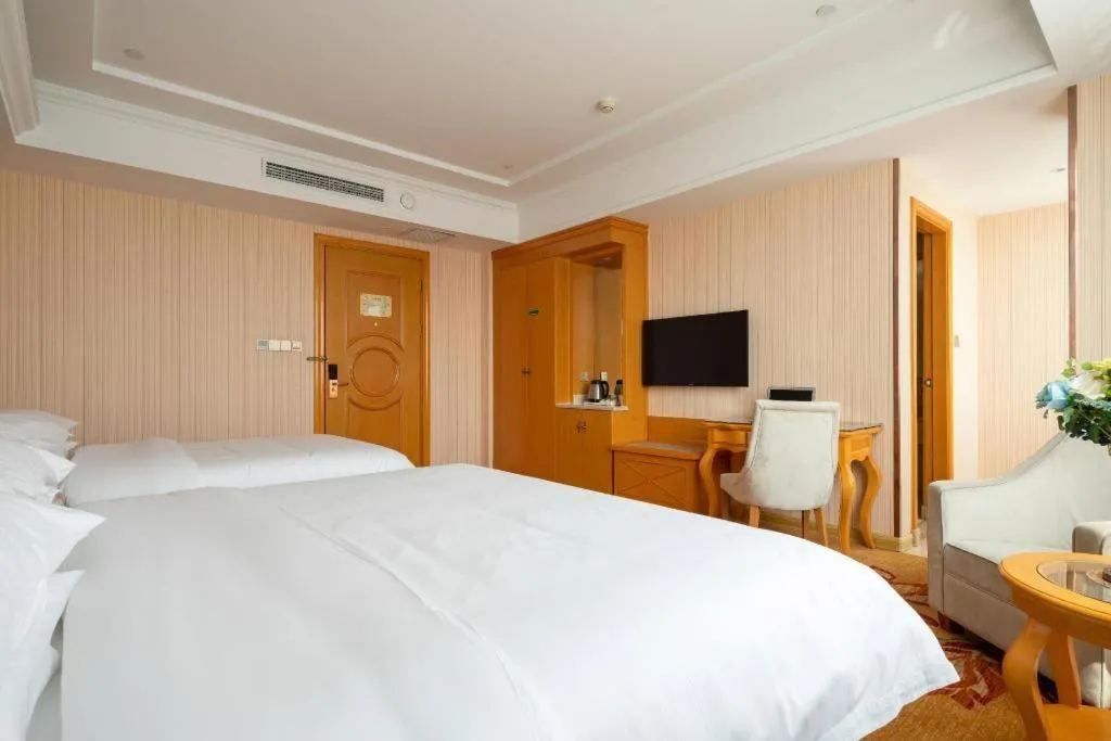 Bed in Vienna Hotel Tianjin 5th Avenue Youyi Road Cultural Center Metro Station