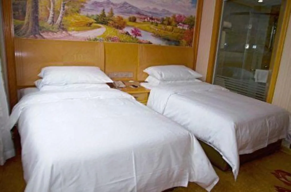 Bed in Vienna Hotel Tianjin 5th Avenue Youyi Road Cultural Center Metro Station