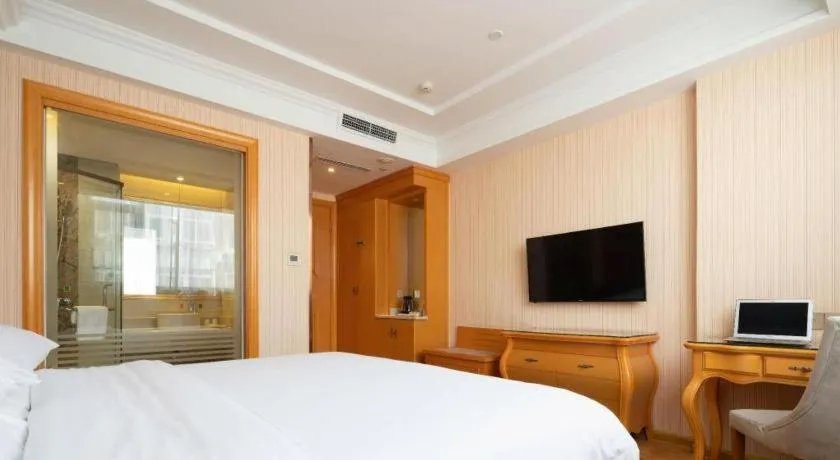 Bed in Vienna Hotel Tianjin 5th Avenue Youyi Road Cultural Center Metro Station