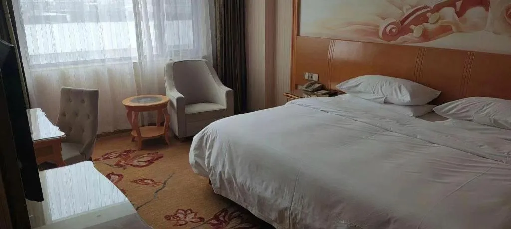 Bed in Vienna Hotel Tianjin 5th Avenue Youyi Road Cultural Center Metro Station