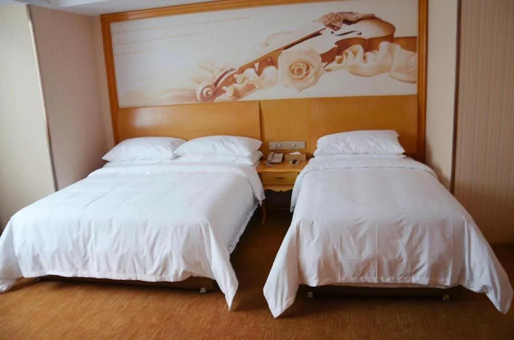 Bed in Vienna Hotel Tianjin 5th Avenue Youyi Road Cultural Center Metro Station