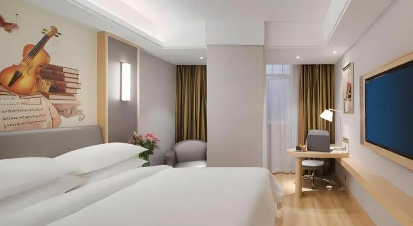 Bed in Vienna Hotel Shanghai Hongqiao Hub National Exhibition Center Huqingping Road