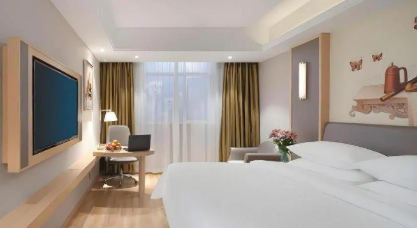 Bed in Vienna Hotel Shanghai Hongqiao Hub National Exhibition Center Huqingping Road