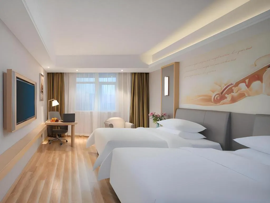 Bed in Vienna Hotel Shanghai Hongqiao Hub National Exhibition Center Huqingping Road