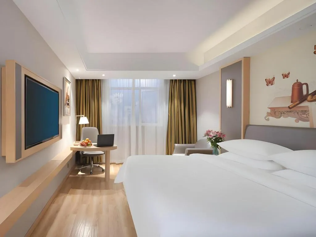 Bed in Vienna Hotel Shanghai Hongqiao Hub National Exhibition Center Huqingping Road