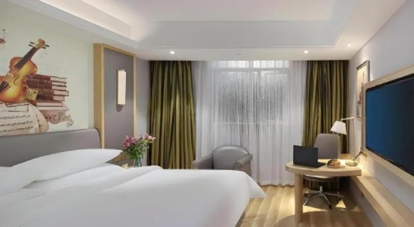 Bed in Vienna Hotel Shanghai Hongqiao Hub National Exhibition Center Huqingping Road