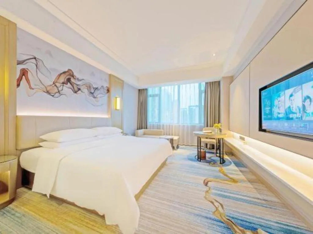 Bed in Venus Royal Hotel Guangdong Zhongshan Dongfeng Center