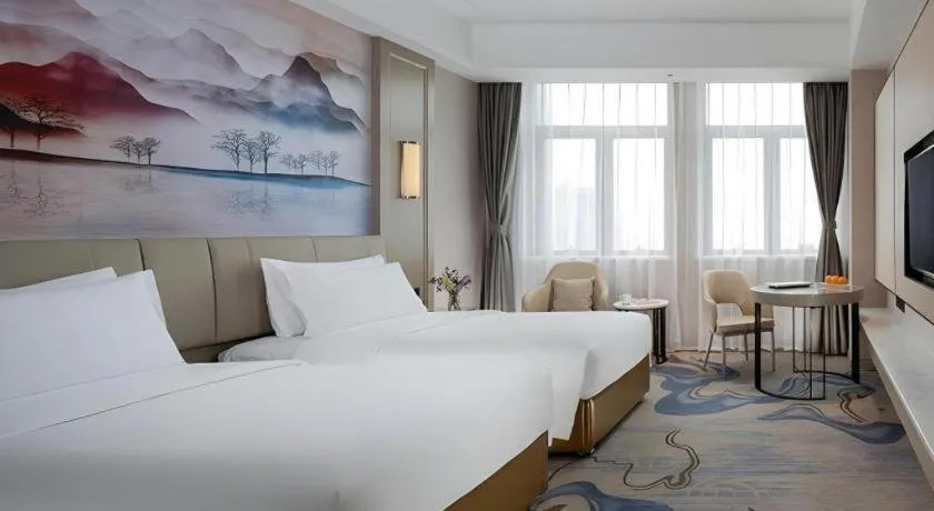 Bed in Venus Royal Hotel Guangdong Zhongshan Dongfeng Center