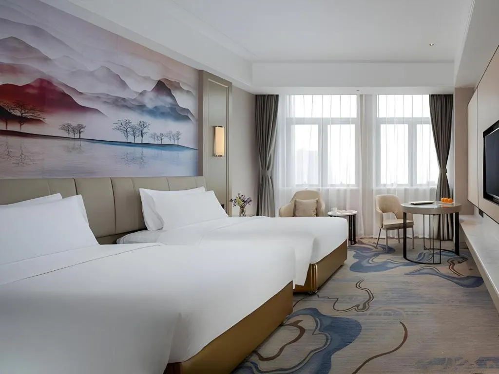 Bed in Venus Royal Hotel Guangdong Zhongshan Dongfeng Center