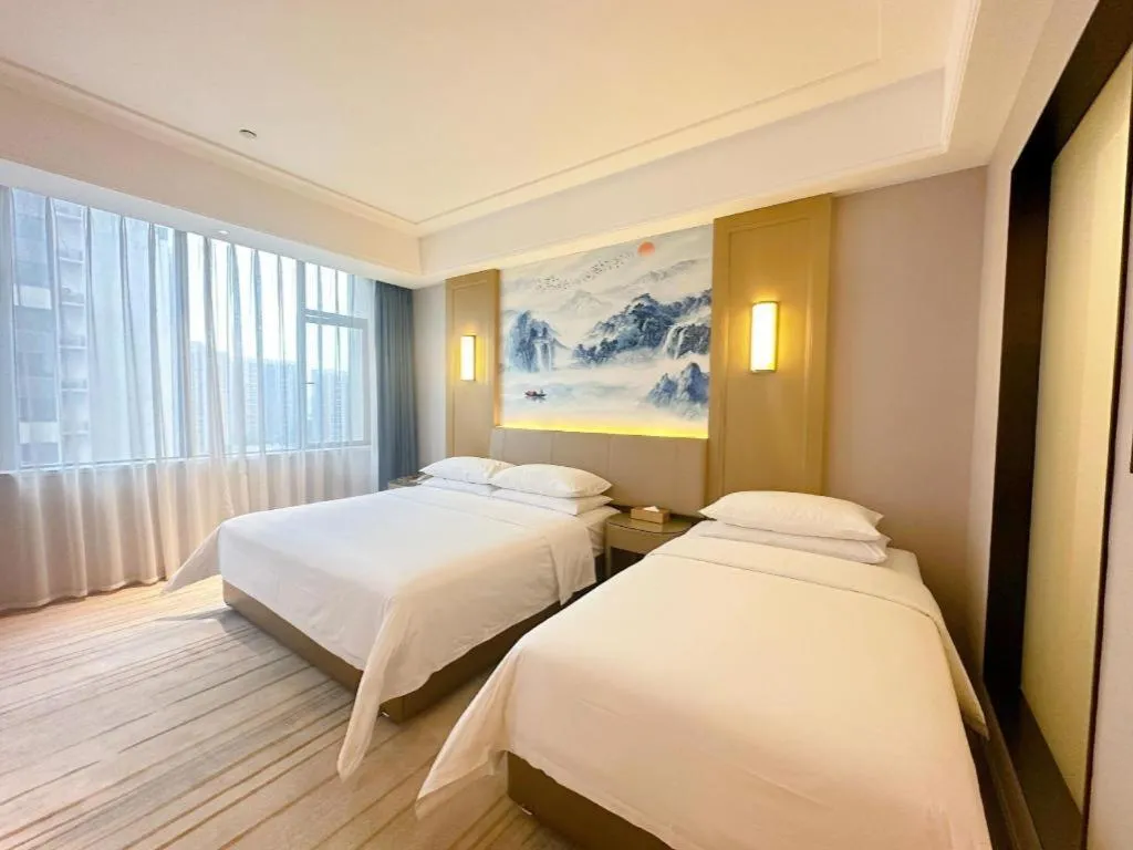 Bed in Venus Royal Hotel Guangdong Zhongshan Dongfeng Center