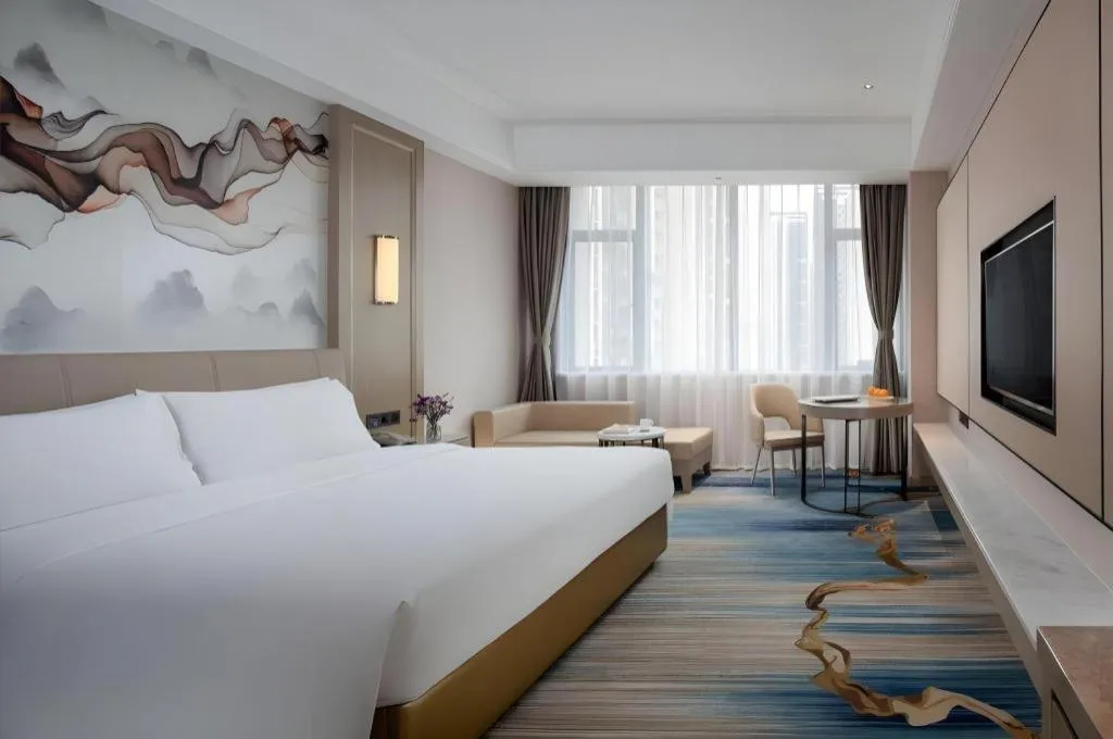 Bed in Venus Royal Hotel Guangdong Zhongshan Dongfeng Center