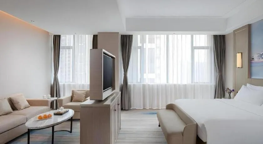 Bed in Venus Royal Hotel Guangdong Zhongshan Dongfeng Center