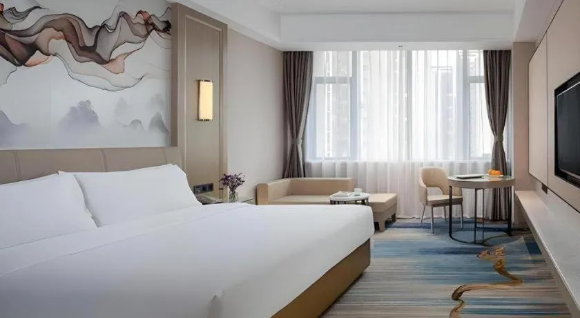 Bed in Venus Royal Hotel Guangdong Zhongshan Dongfeng Center