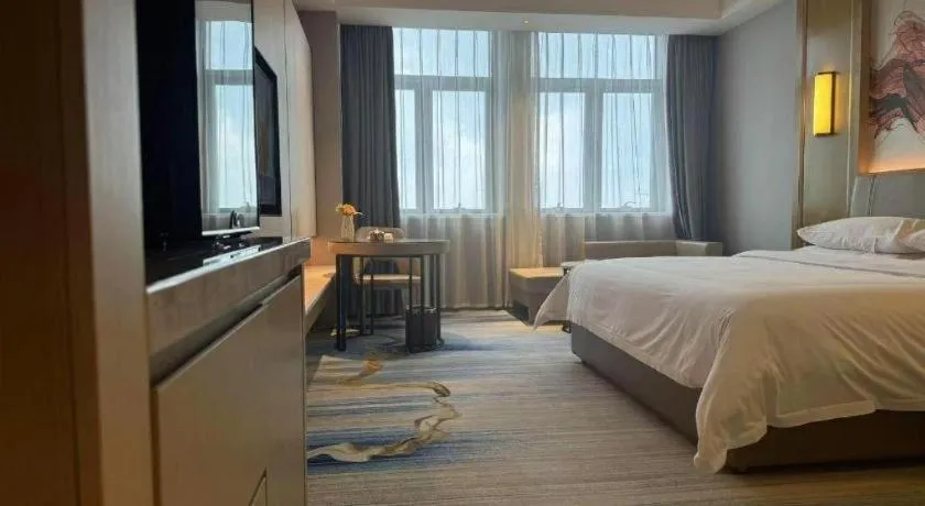 Bed in Venus Royal Hotel Guangdong Zhongshan Dongfeng Center