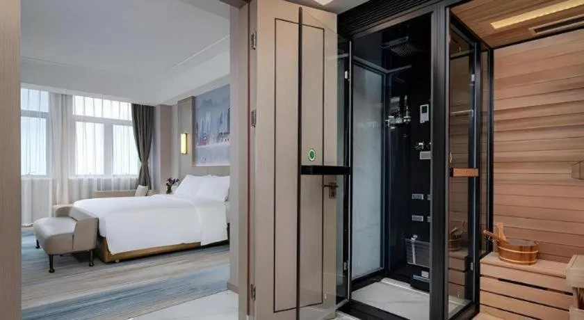 Bed in Venus Royal Hotel Guangdong Zhongshan Dongfeng Center