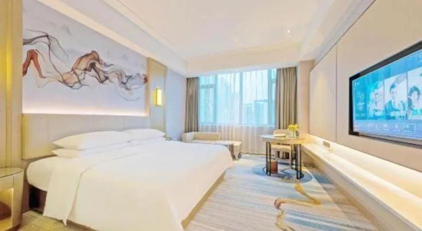 Bed in Venus Royal Hotel Guangdong Zhongshan Dongfeng Center