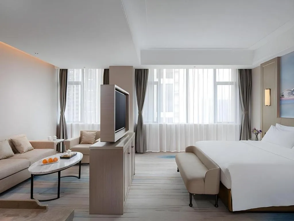 Bed in Venus Royal Hotel Guangdong Zhongshan Dongfeng Center