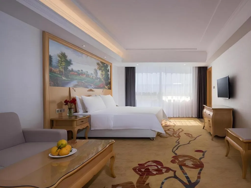 Bed in Vienna Hotel Guangdong Huizhou Huabianling Square