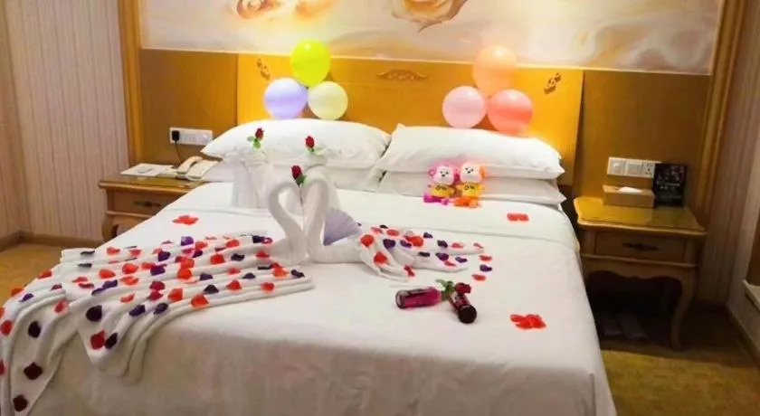 Bed in Vienna Hotel Guangxi Yulin Rong County Guinan Road