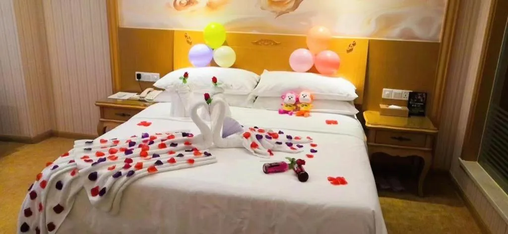 Bed in Vienna Hotel Guangxi Yulin Rong County Guinan Road