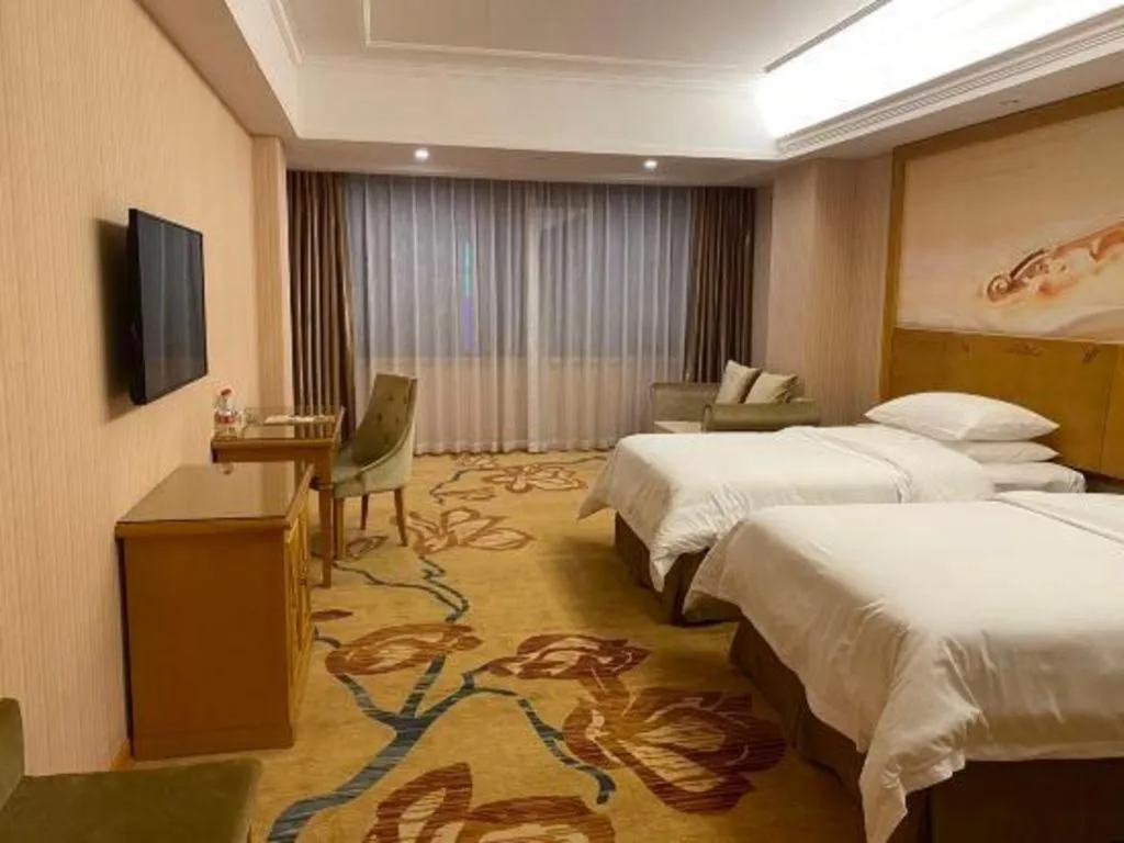 Bed in Vienna Hotel Guangxi Yulin Rong County Guinan Road