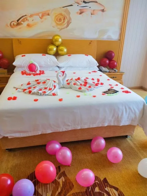 Bed in Vienna Hotel Guangxi Yulin Rong County Guinan Road