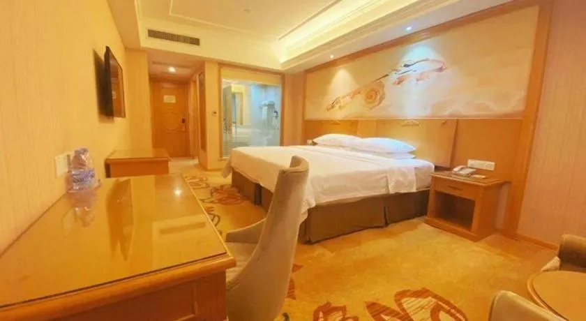 Bed in Vienna Hotel Guangxi Yulin Rong County Guinan Road