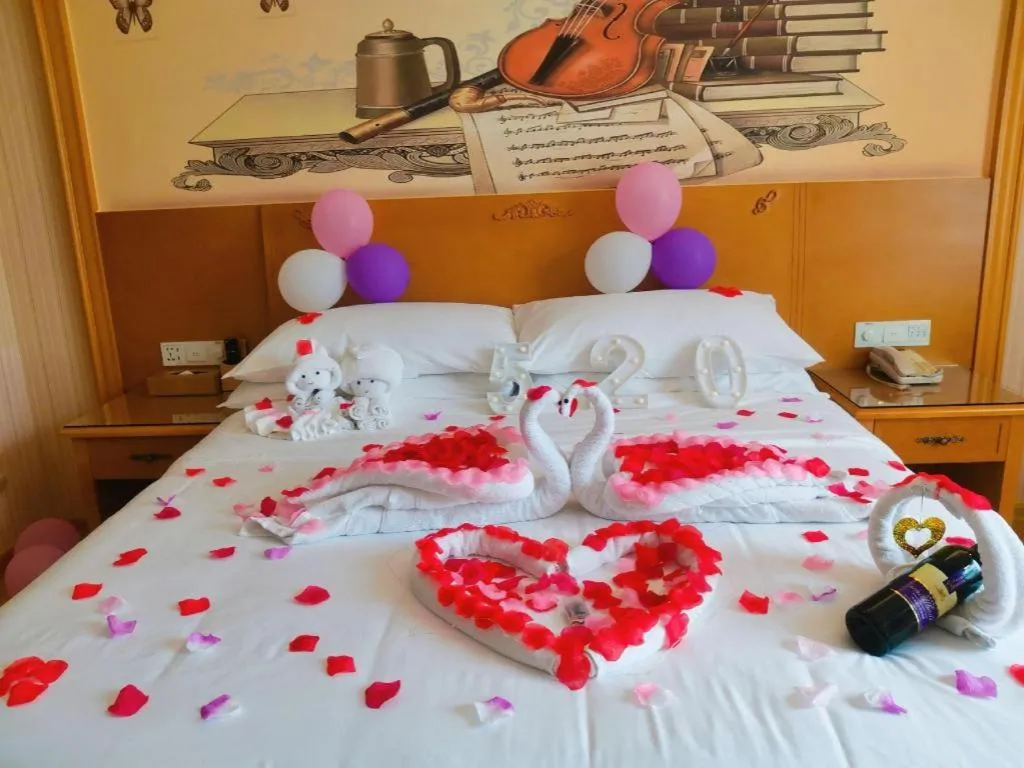 Bed in Vienna Hotel Guangxi Yulin Rong County Guinan Road