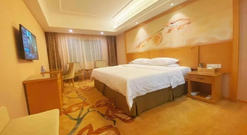 Bed in Vienna Hotel Guangxi Yulin Rong County Guinan Road