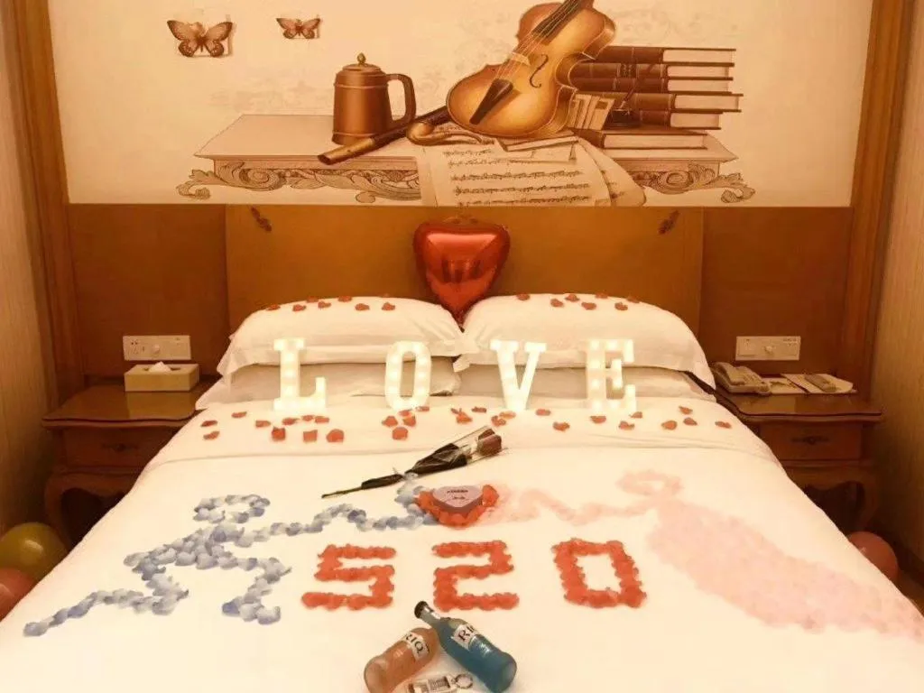 Bed in Vienna Hotel Guangxi Yulin Rong County Guinan Road