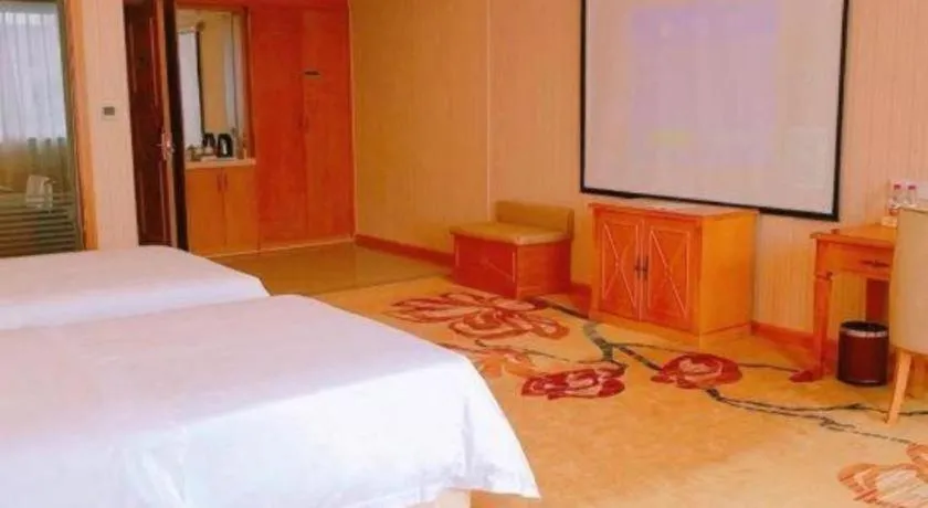 Bed in Vienna Hotel Guangxi Yulin Rong County Guinan Road