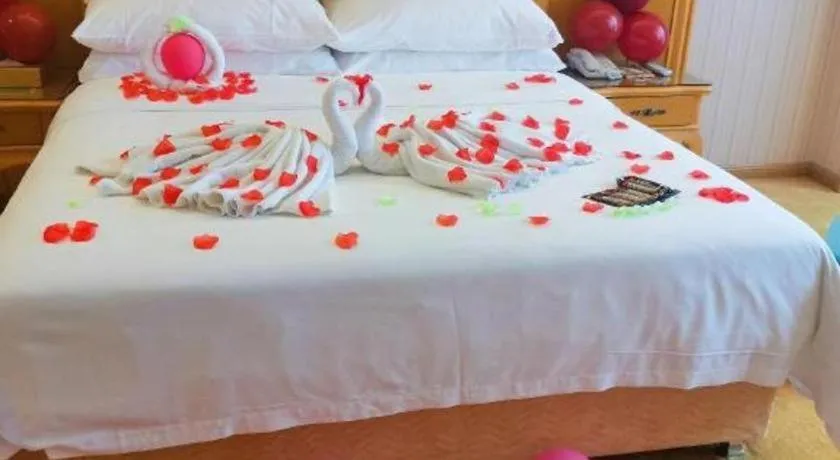 Bed in Vienna Hotel Guangxi Yulin Rong County Guinan Road