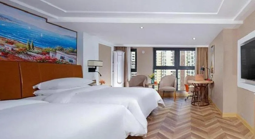 Bed in Vienna Hotel Chengdu Exhibition Center In Time City