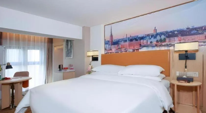 Bed in Vienna Hotel Chengdu Exhibition Center In Time City