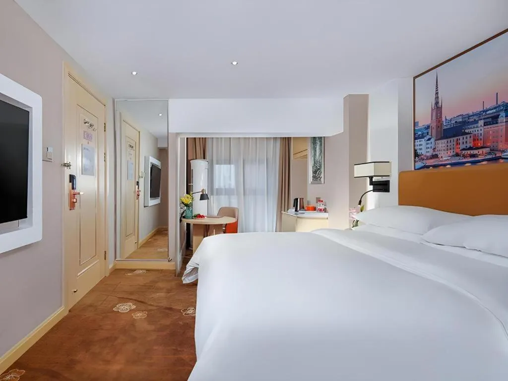 Bed in Vienna Hotel Chengdu Exhibition Center In Time City