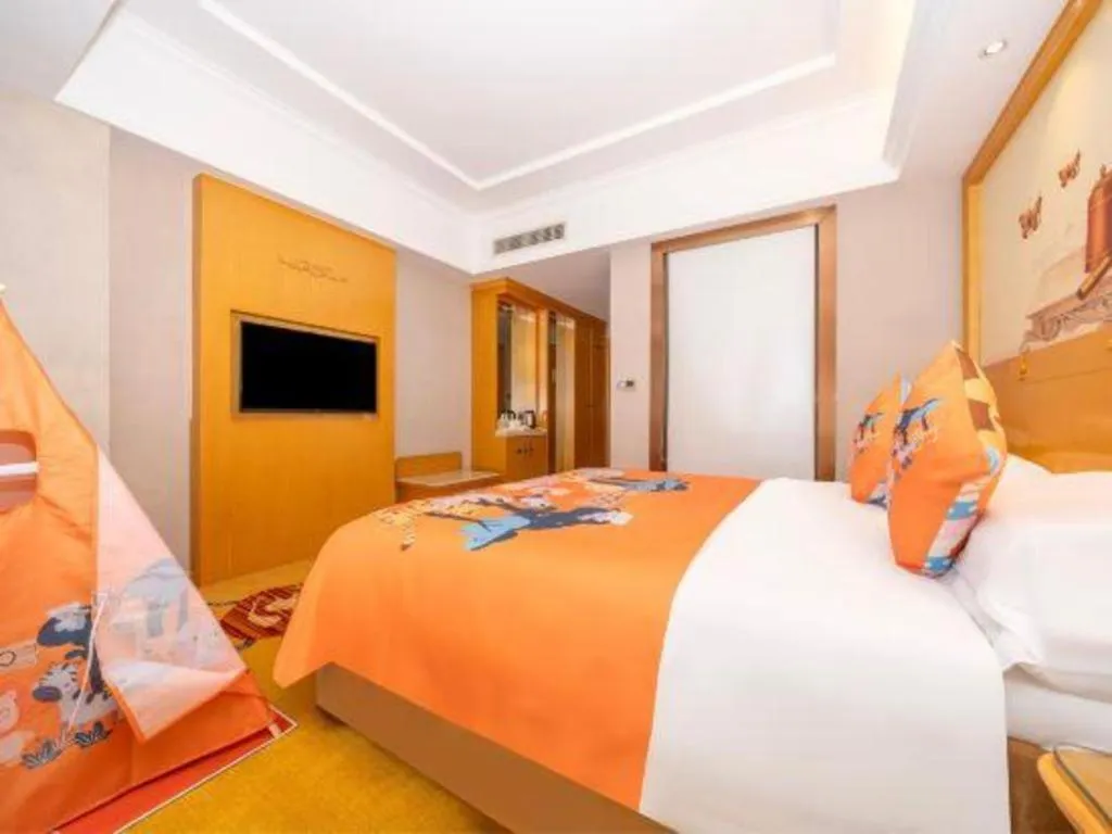 Bed in Vienna Hotel Guangxi Fangcheng