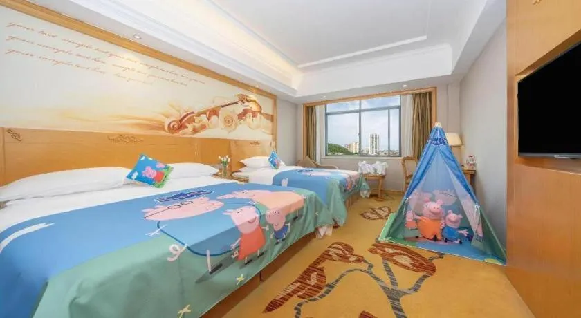 Bed in Vienna Hotel Guangxi Fangcheng