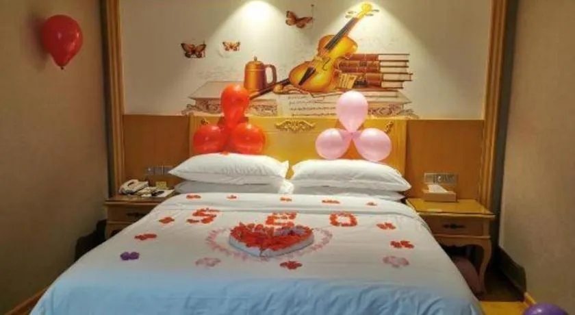 Bed in Vienna Hotel Guangxi Fangcheng