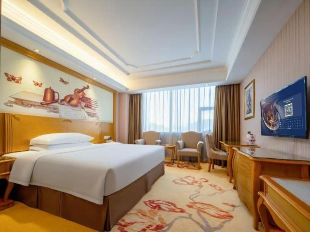 Bed in Vienna Hotel Shenzhen Pingdi Huancheng South Road