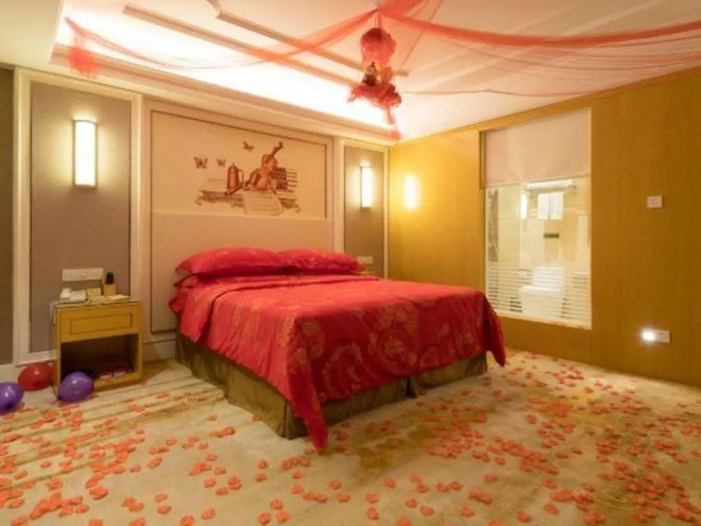 Bed in Vienna Hotel Shenzhen Pingdi Huancheng South Road
