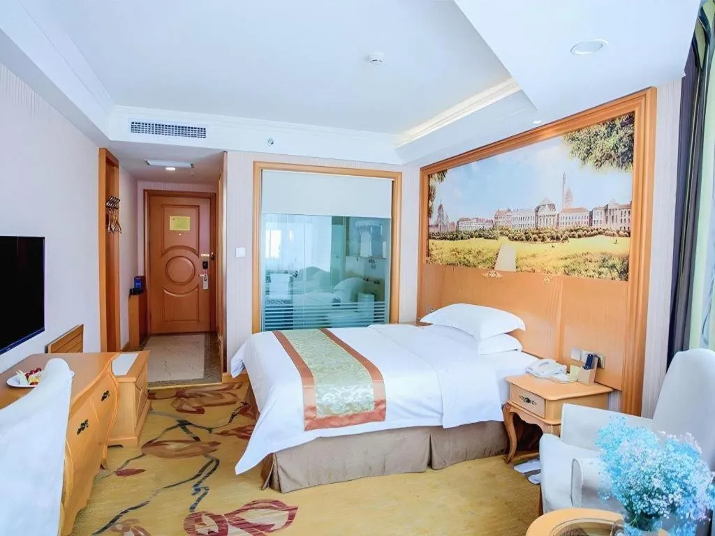 Bed in Vienna Hotel Shandong Laizhou Langhu International Plaza