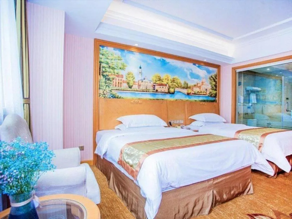 Bed in Vienna Hotel Shandong Laizhou Langhu International Plaza
