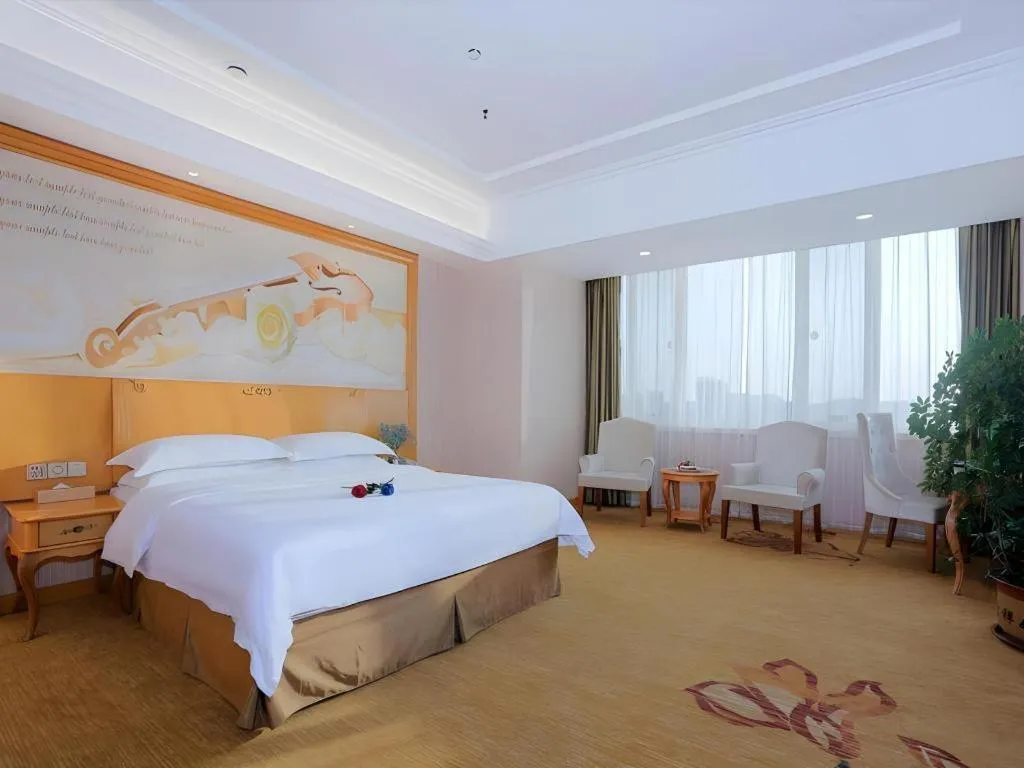 Bed in Vienna Hotel Shandong Laizhou Langhu International Plaza
