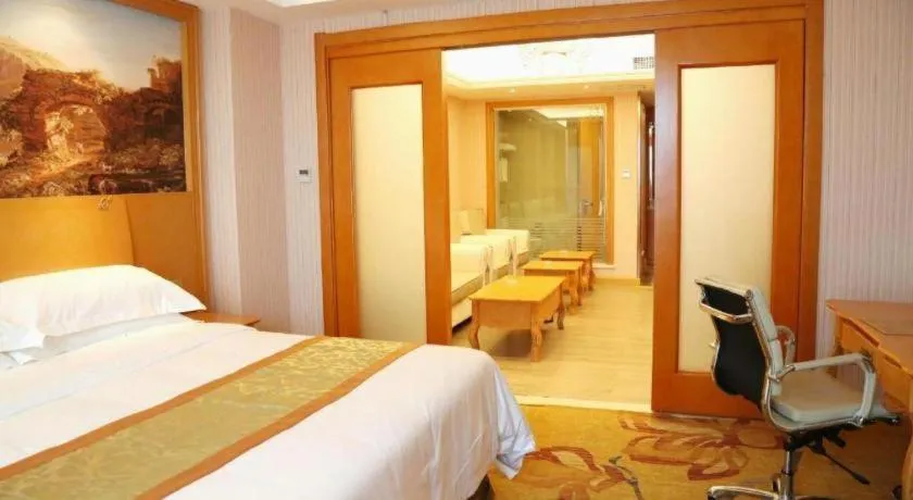 Bed in Vienna Hotel Shandong Laizhou Langhu International Plaza