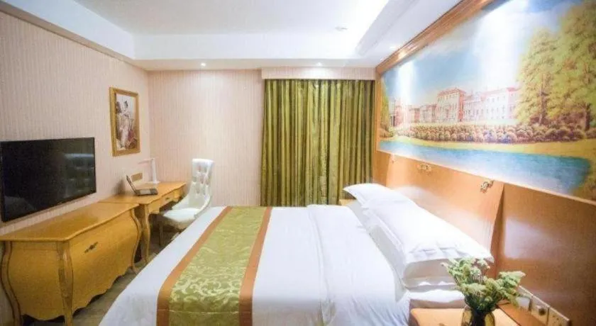 Bed in Vienna Hotel Shandong Laizhou Langhu International Plaza