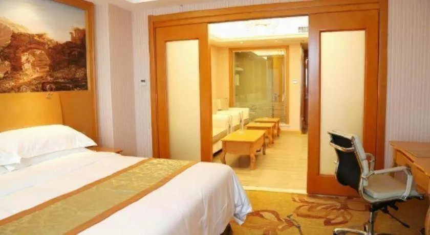 Bed in Vienna Hotel Shandong Laizhou Langhu International Plaza