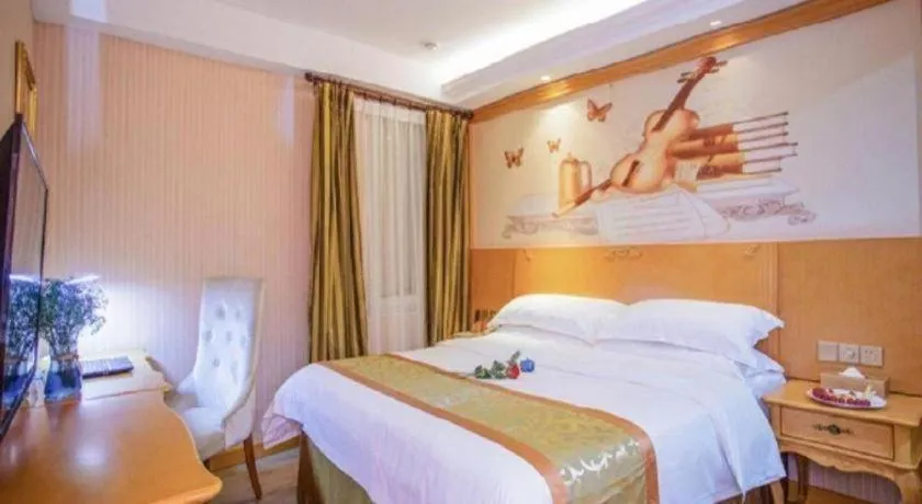 Bed in Vienna Hotel Shandong Laizhou Langhu International Plaza