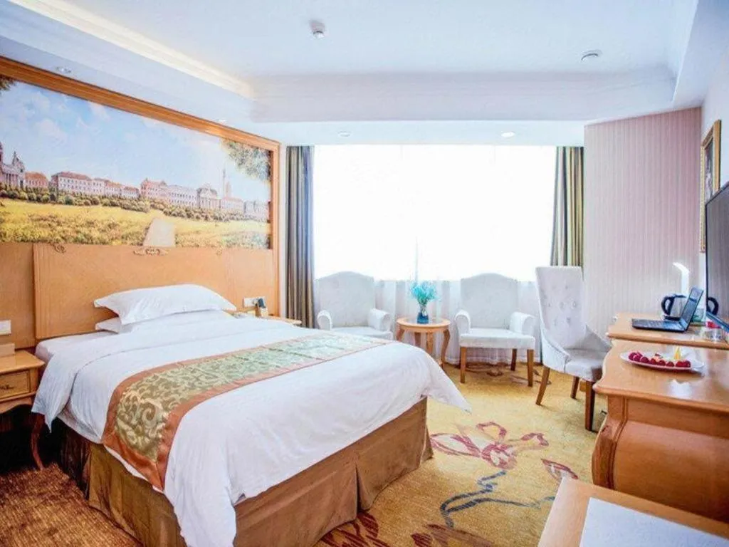 Bed in Vienna Hotel Shandong Laizhou Langhu International Plaza