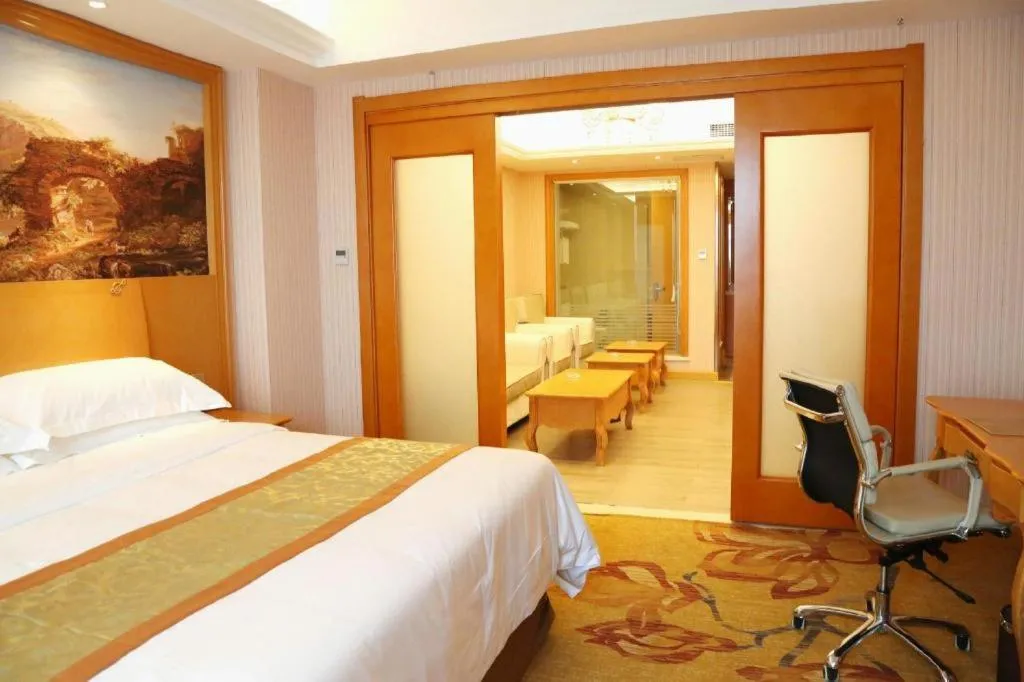Bed in Vienna Hotel Shandong Laizhou Langhu International Plaza